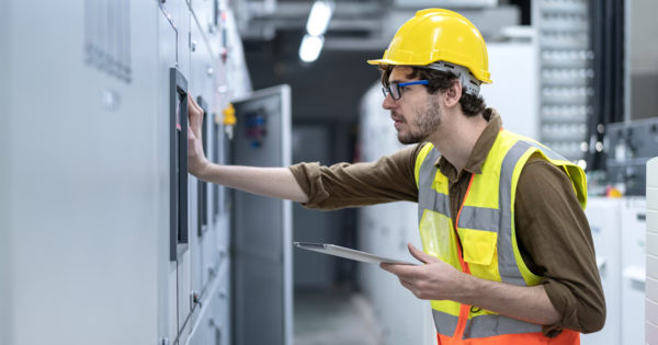 Field service engineer capturing field asset data